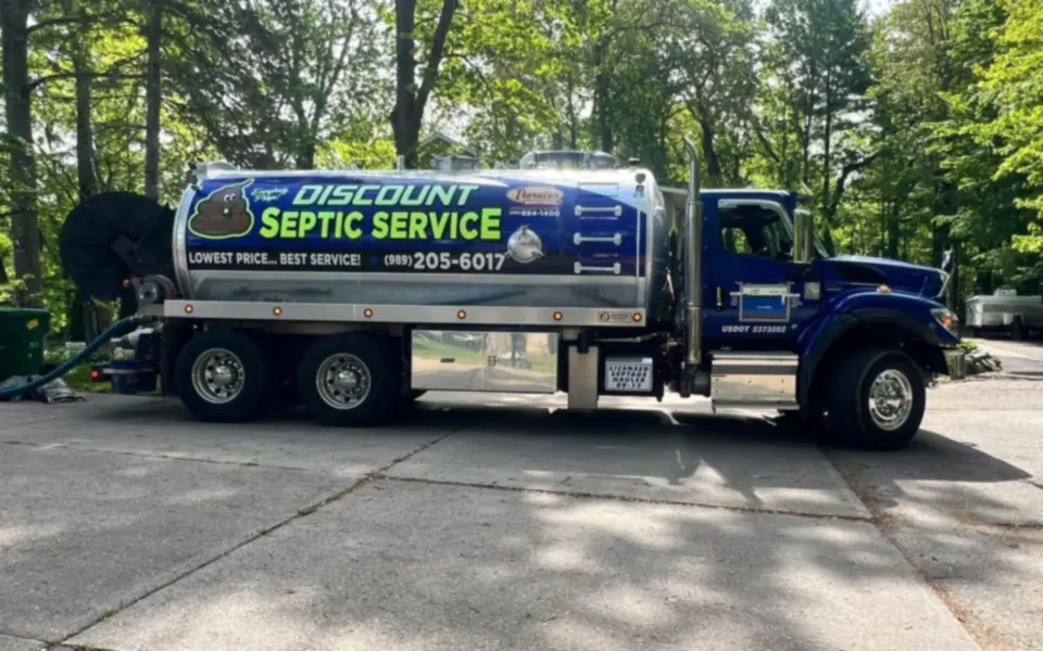 Discount Septic Service pump truck parked on a residential street in Bay City, Michigan